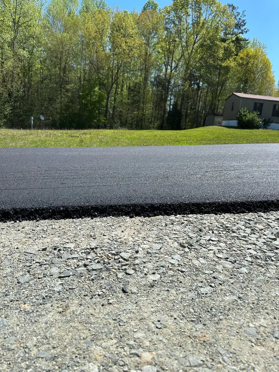 StrawHat Paving job photo – thick asphalt edge closeup